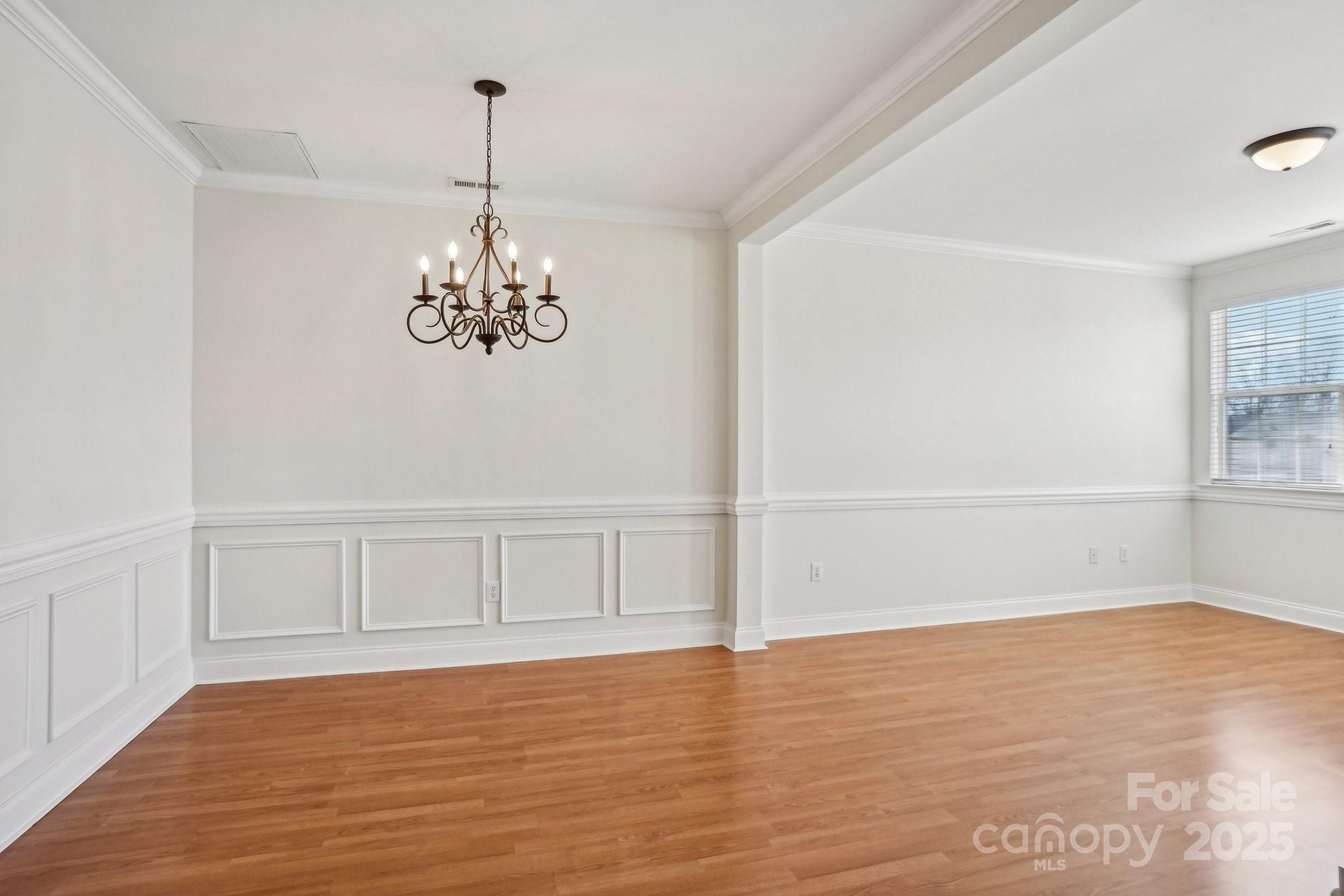127 High Ridge Road Mooresville, NC 28117 - Photo 6 of 34 a view of a room with window and wooden floor