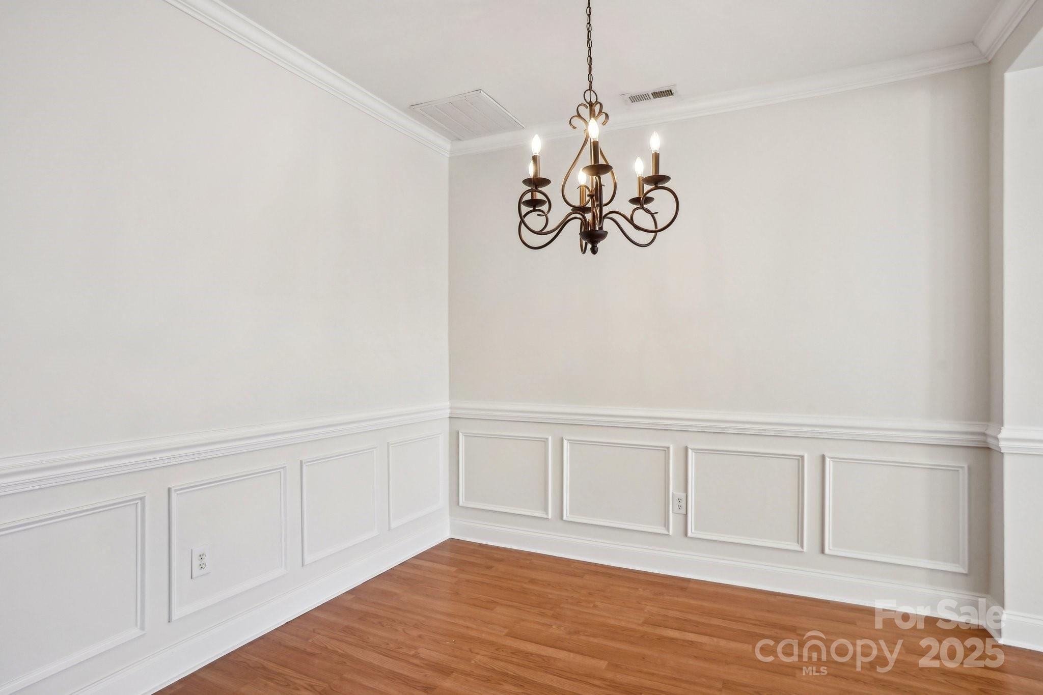 127 High Ridge Road Mooresville, NC 28117 - Photo 8 of 34 a view of an empty room with wooden floor