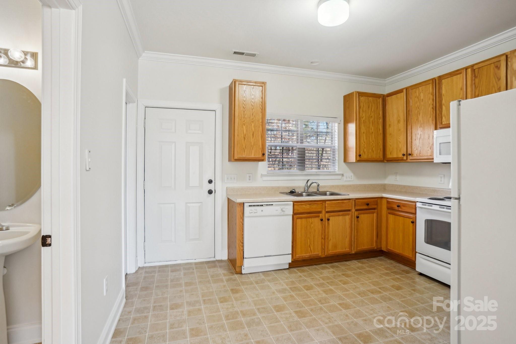 127 High Ridge Road Mooresville, NC 28117 - Photo 10 of 34 a kitchen with stainless steel appliances granite countertop a refrigerator and a stove top oven