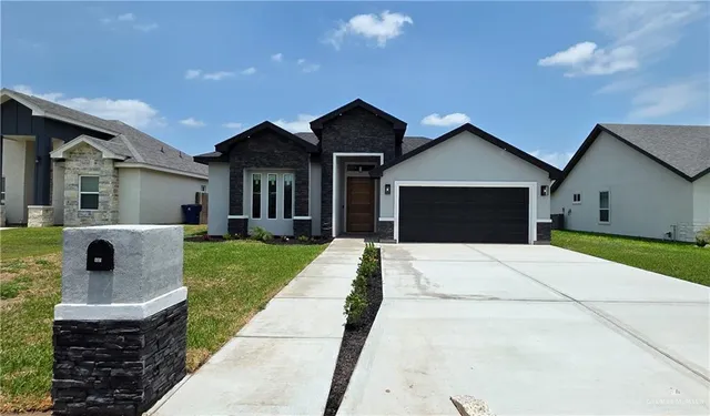 a front view of house with yard