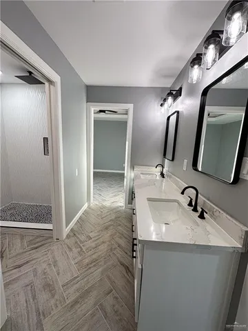 a bathroom with a toilet and a sink