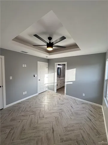 a house view with a backyard space