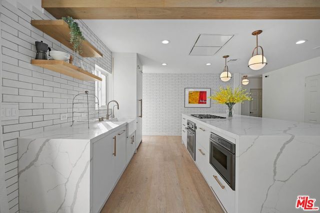 $1,995,000 | 1155 South Rimpau Boulevard, Los Angeles, CA 90019