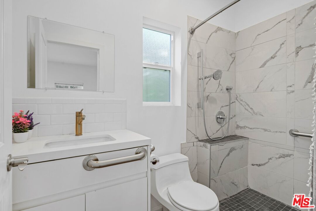 1155 South Rimpau Boulevard Los Angeles, CA 90019 - Photo 32 of 45