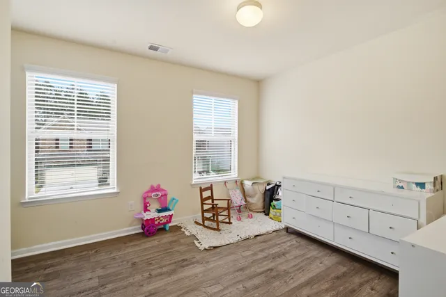 a utility room with closet dryer and washer