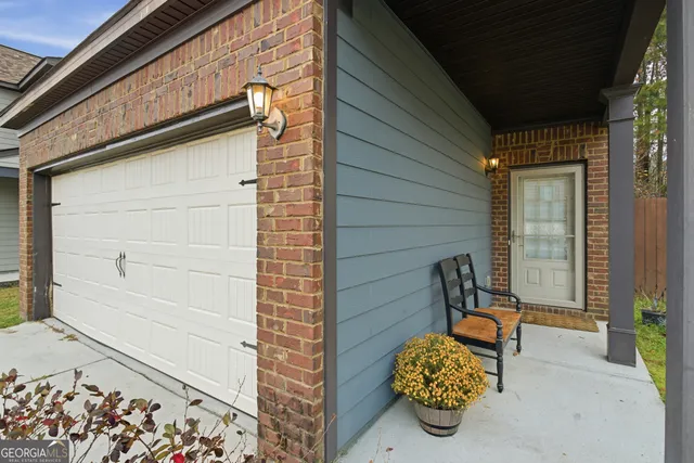 a view of a hallway view with living room