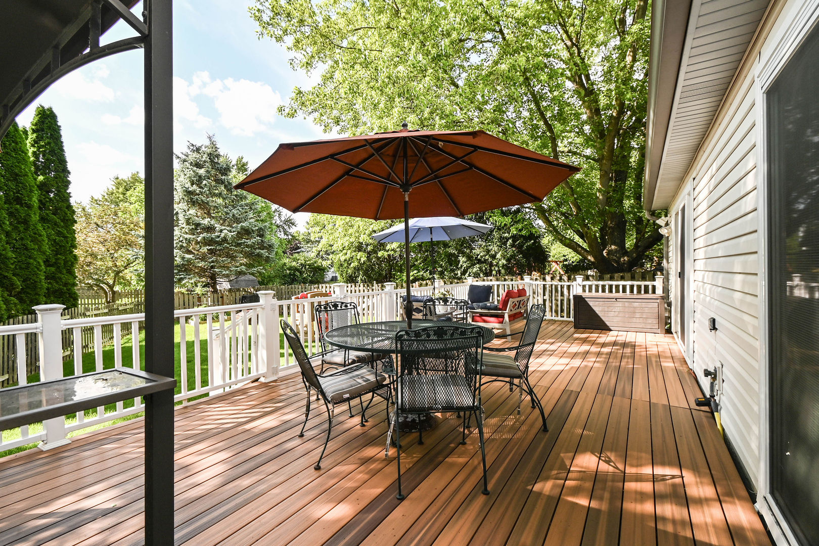 1333 Regency Lane Round Lake, IL 60073 - Photo 26 of 31 a view of balcony with outdoor seating and wooden floor
