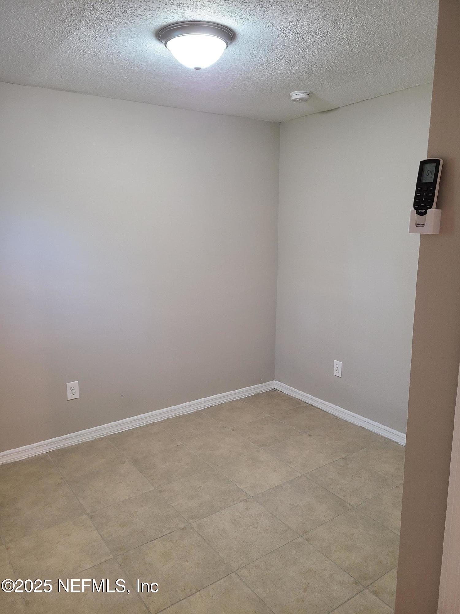 5239 Cruz Road Jacksonville, FL 32207 - Photo 28 of 33 29_Back Property - Bedroom 1