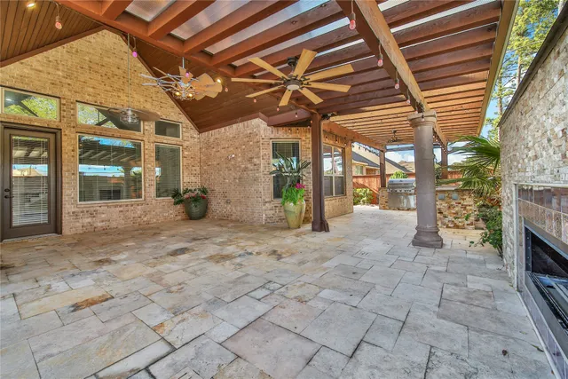 an aerial view of residential houses with outdoor space and swimming pool