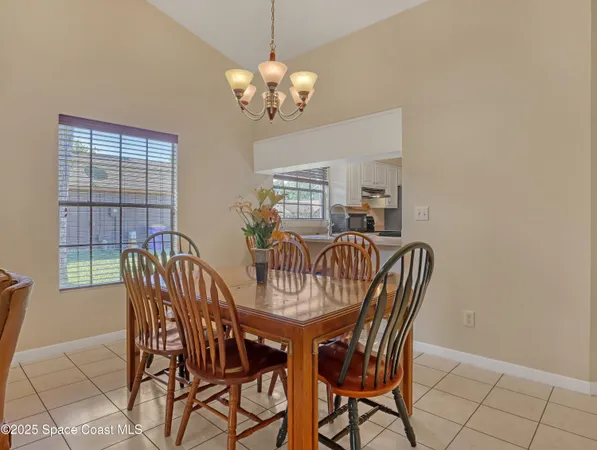a view of a house with garden and plants