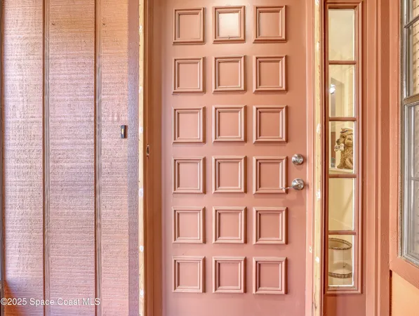 a living room with a couch and a fireplace