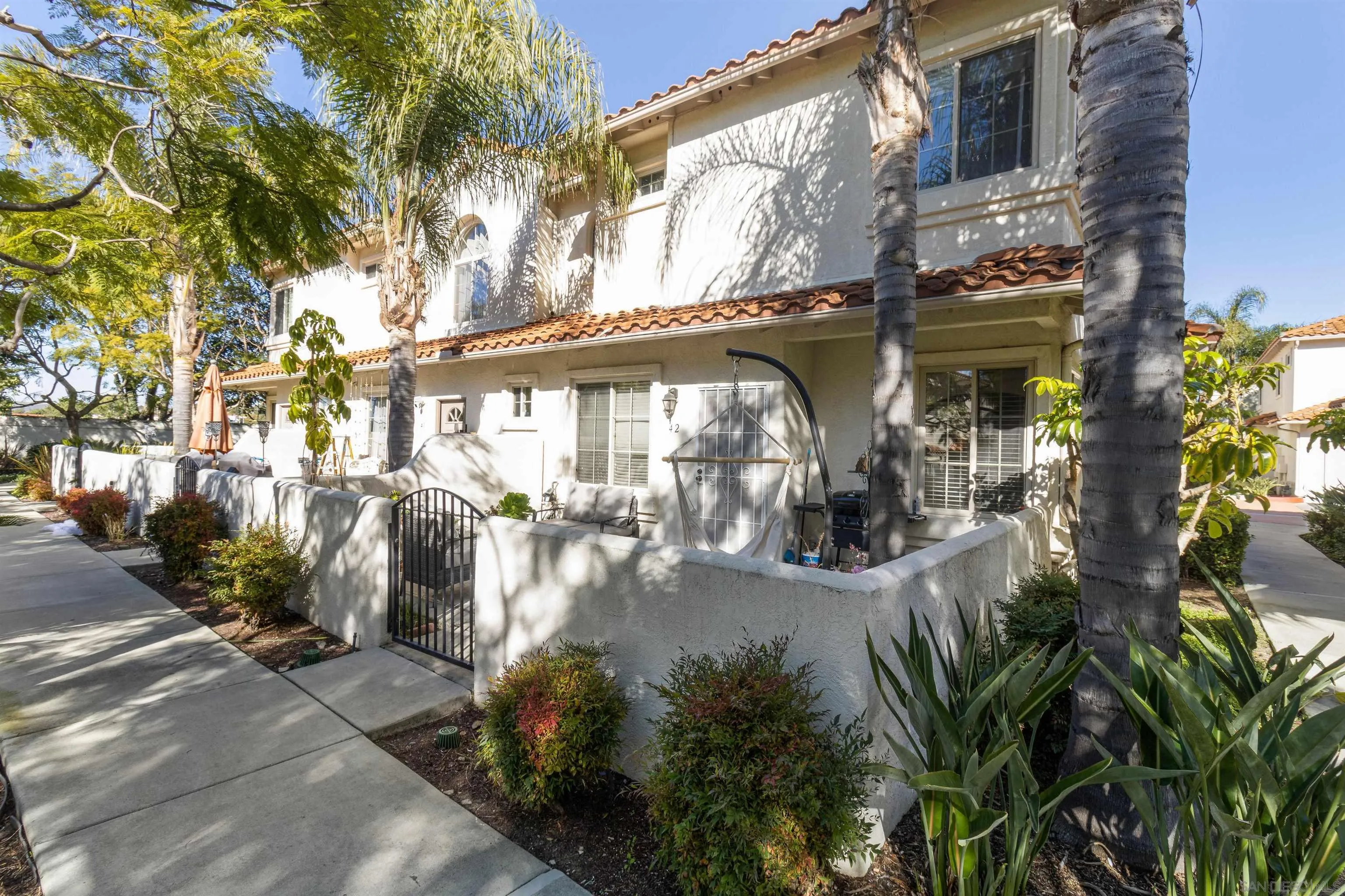 4046 Craven Road, Unit 42 Oceanside, CA 92057 - Photo 1 of 17 a view of a street with plants