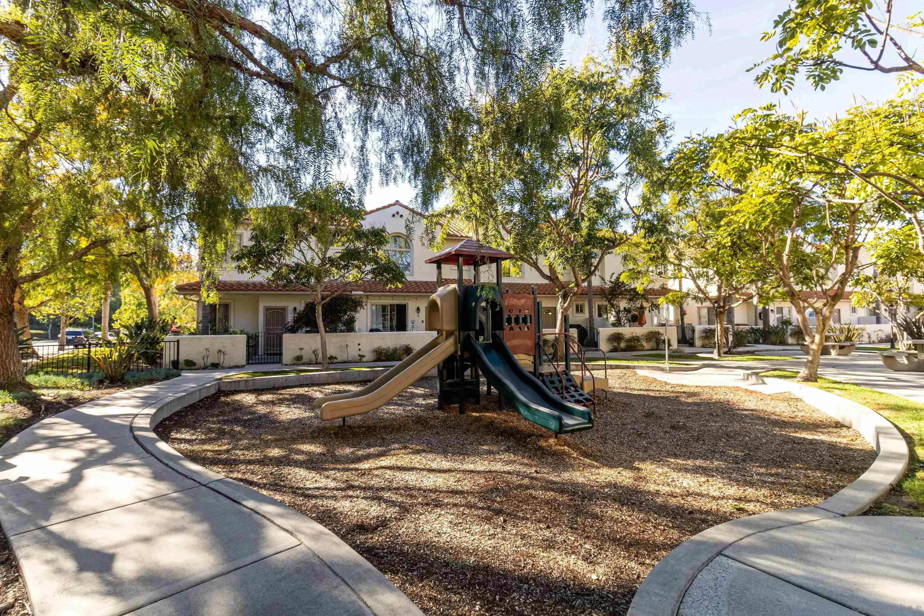 4046 Craven Road, Unit 42 Oceanside, CA 92057 - Photo 12 of 17 a view of a park with large trees