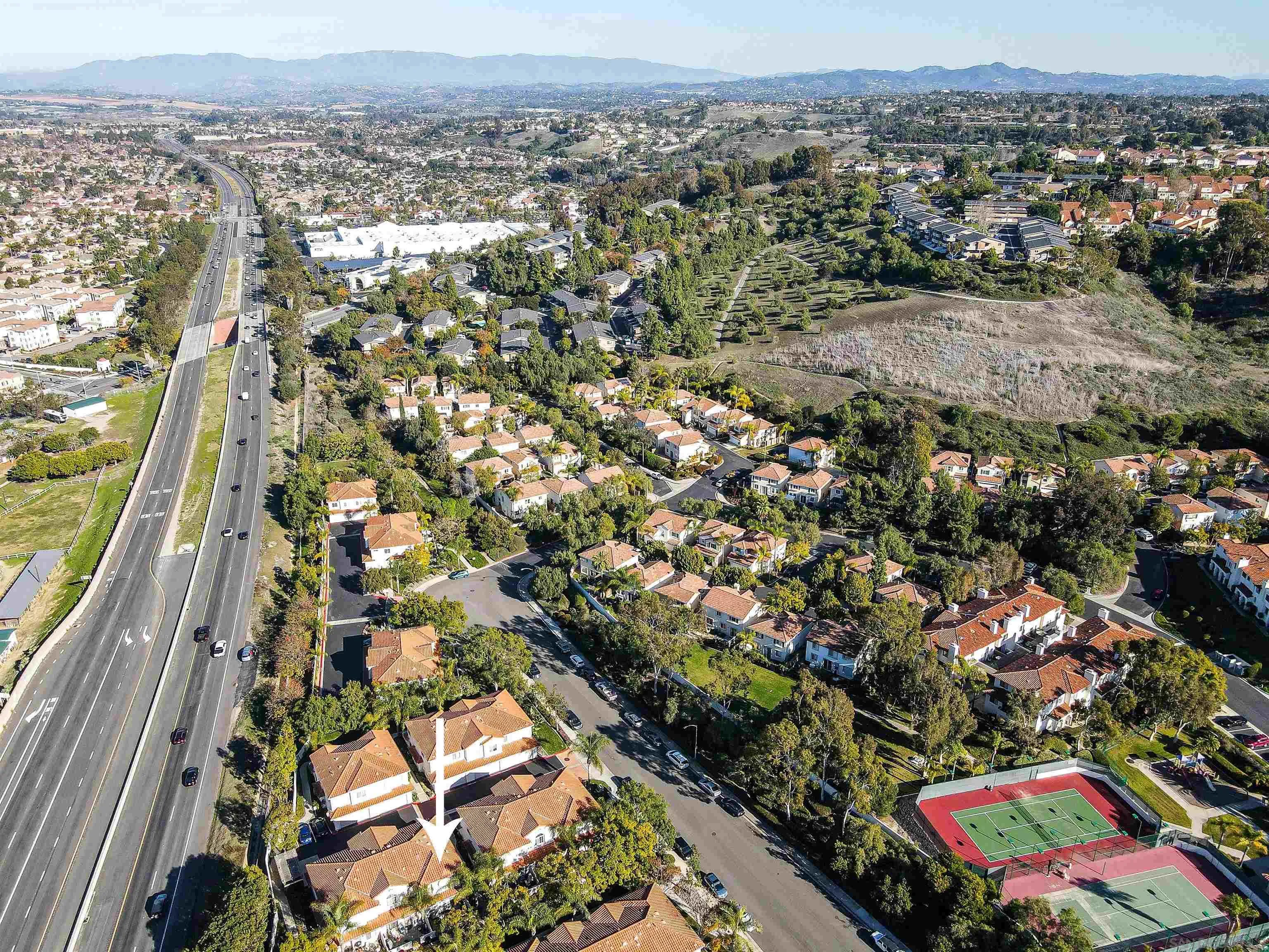 4046 Craven Road, Unit 42 Oceanside, CA 92057 - Photo 16 of 17 an aerial view of residential houses with outdoor space