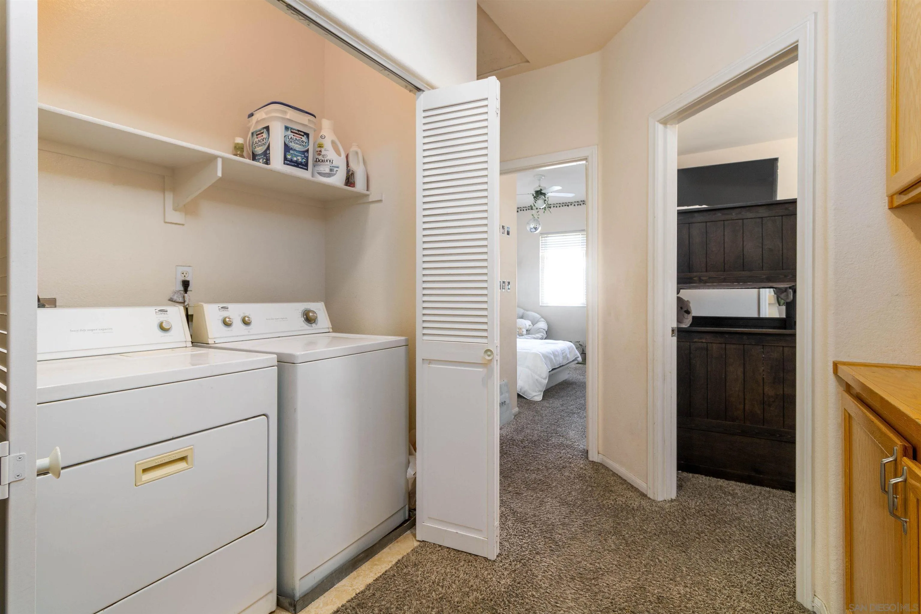 4046 Craven Road, Unit 42 Oceanside, CA 92057 - Photo 7 of 17 a utility room with dryer and washer