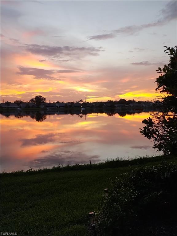 3250 West Crown Pointe Boulevard, Unit 101 Naples, FL 34112 - Photo 30 of 46 a view of city and lake