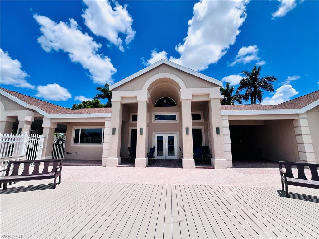 3250 West Crown Pointe Boulevard, Unit 101 Naples, FL 34112 - Photo 44 of 46 a view of a house with a porch