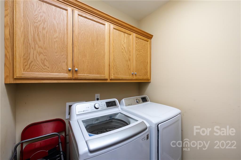 2707 Falling Leaf Court Monroe, NC 28110 - Photo 17 of 36 a utility room with dryer and washer