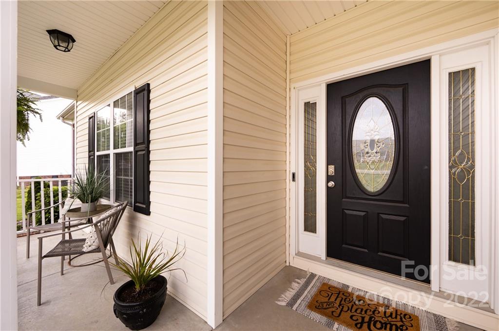 2707 Falling Leaf Court Monroe, NC 28110 - Photo 4 of 36 a front view of a house with garden