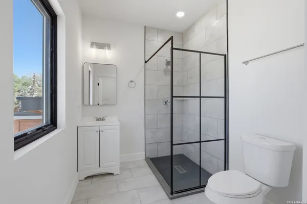 a view of balcony with wooden floor