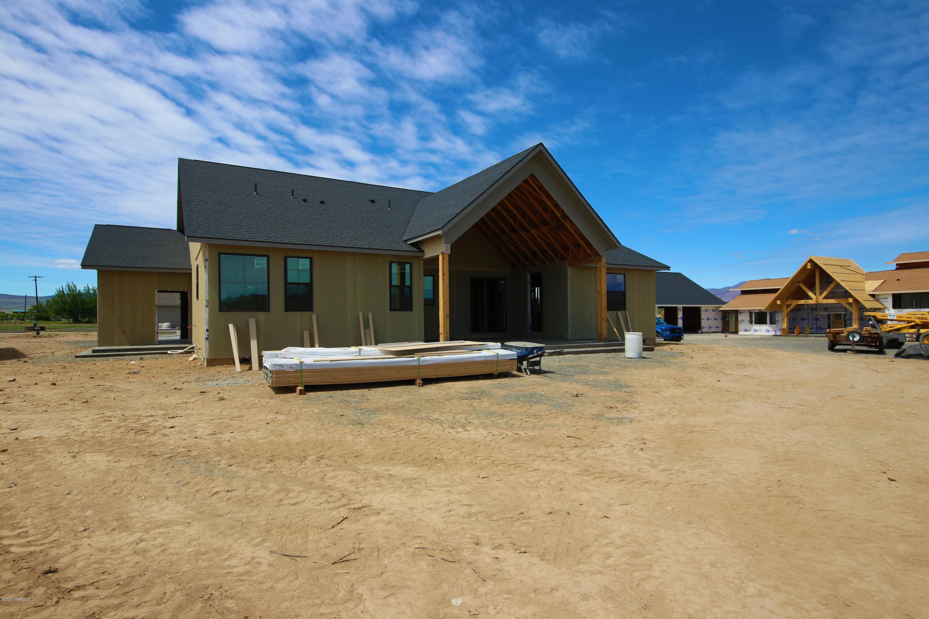 489 Elliott Road Cowiche, WA 98923 - Photo 3 of 10 a view of a house with a patio