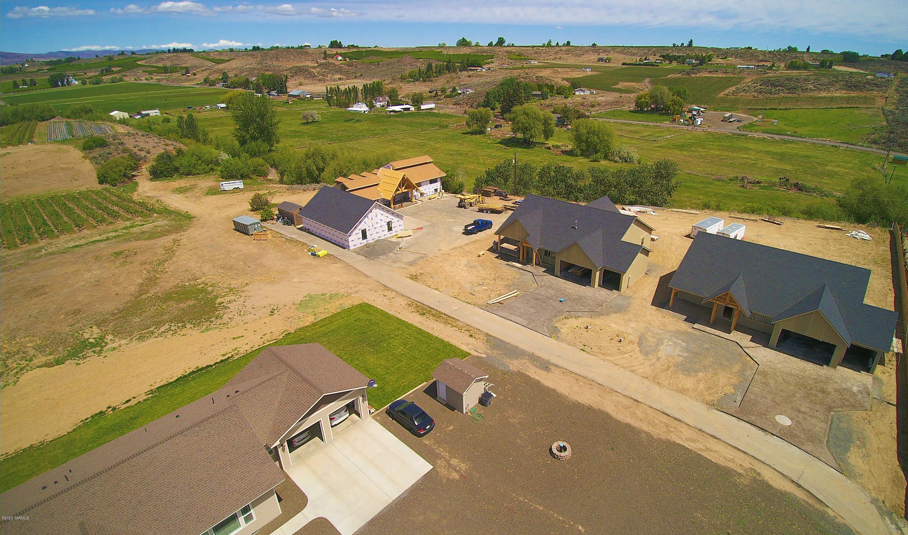 489 Elliott Road Cowiche, WA 98923 - Photo 7 of 10 an aerial view of a house with a ocean view