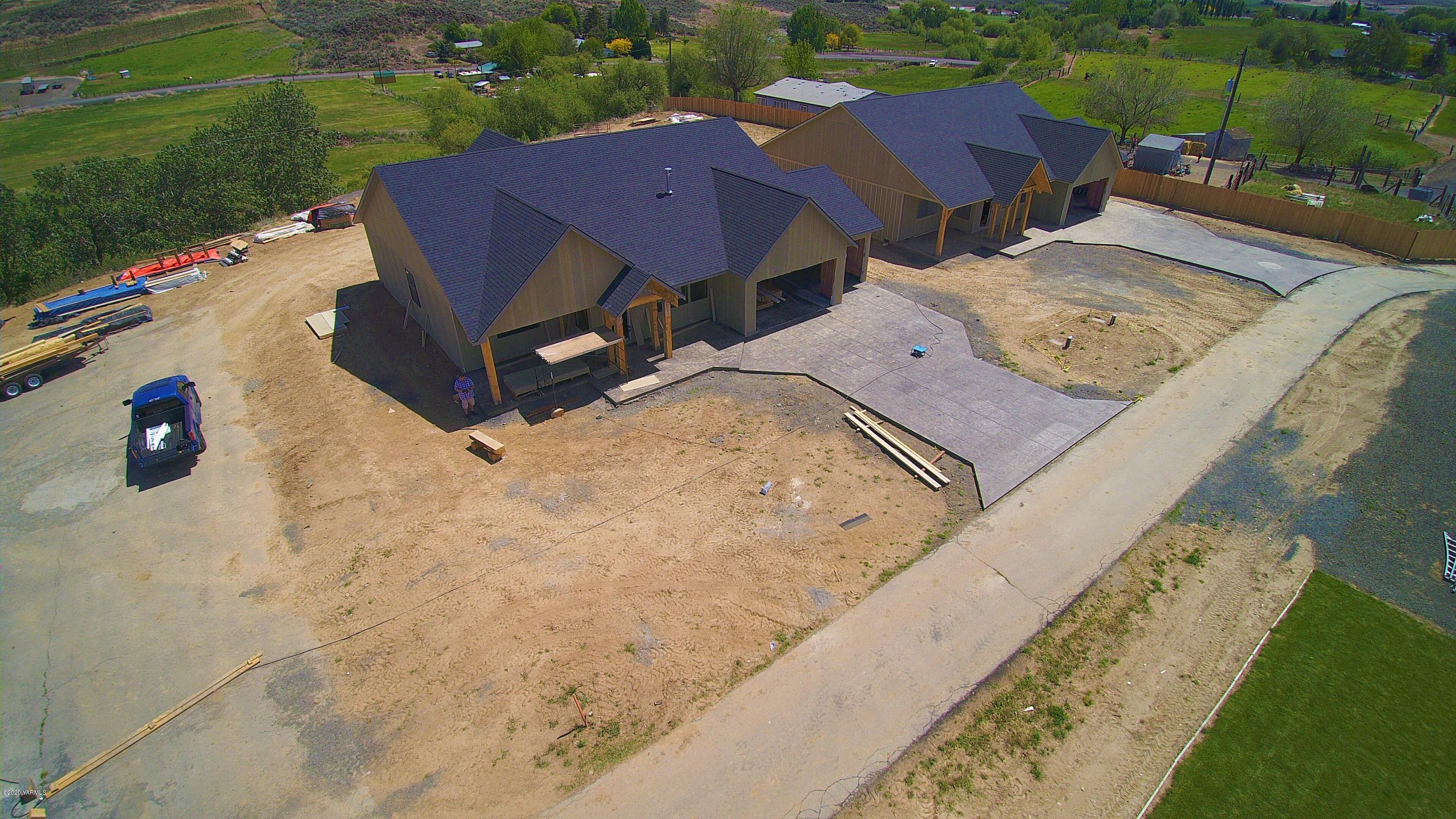 489 Elliott Road Cowiche, WA 98923 - Photo 8 of 10 an aerial view of a house with garden space and street view