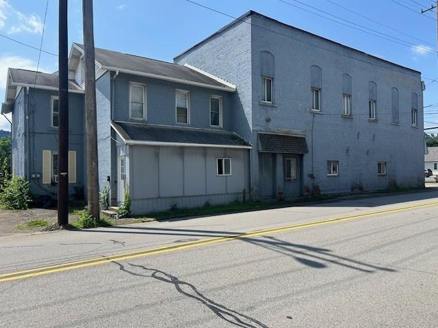 a front view of a house with garage