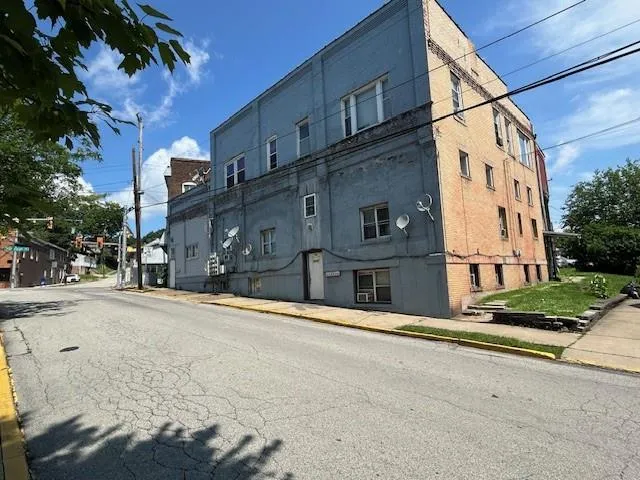 front view of a building with a street