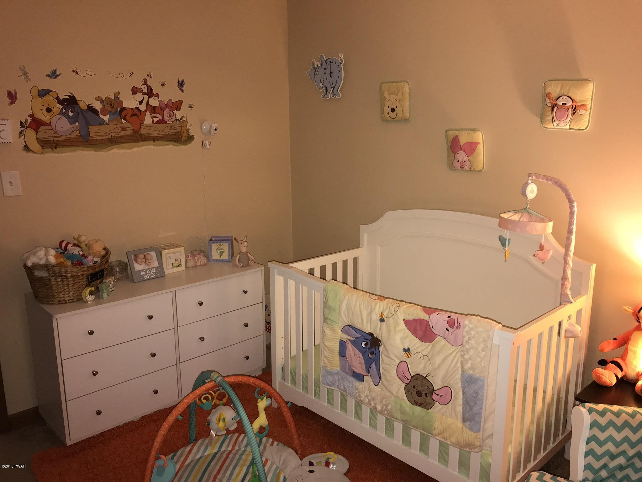186 Gold Key Road Milford, PA 18337 - Photo 12 of 26 a bedroom with a bed and a dresser