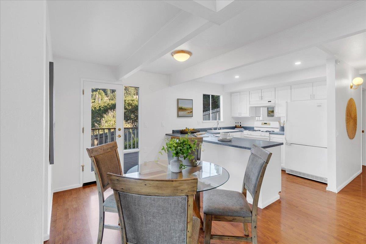 3560 Viola Drive Aromas, CA 95004 - Photo 12 of 42 a view of a dining room with furniture and wooden floor