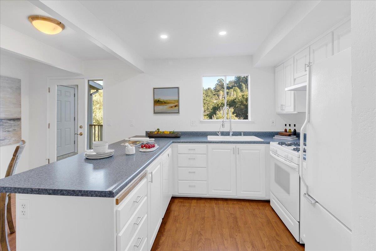 3560 Viola Drive Aromas, CA 95004 - Photo 16 of 42 a kitchen with a sink and cabinets