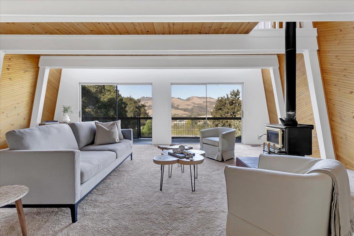 3560 Viola Drive Aromas, CA 95004 - Photo 2 of 42 a living room with furniture and a large window