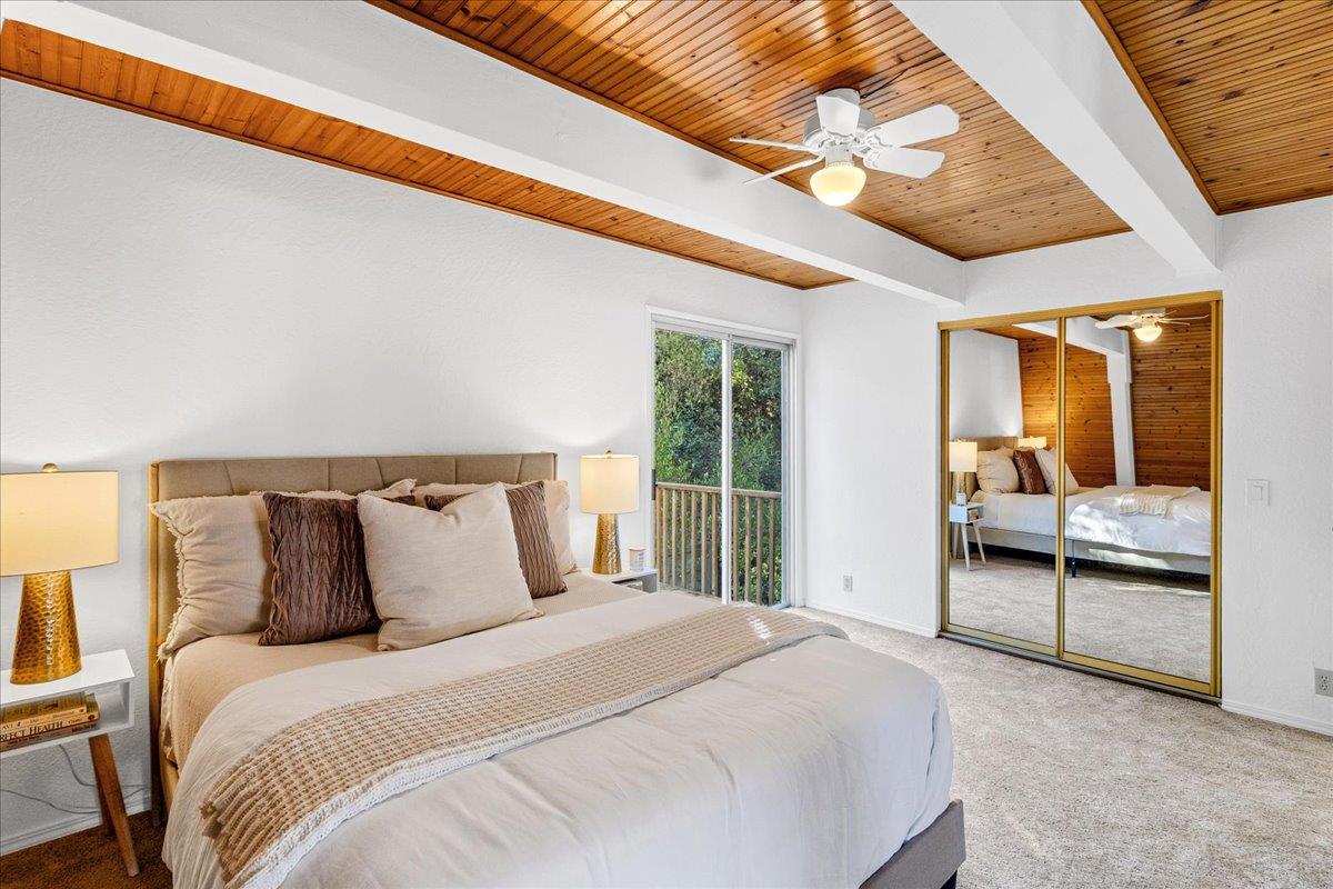 3560 Viola Drive Aromas, CA 95004 - Photo 23 of 42 a bedroom with a large bed and a large window