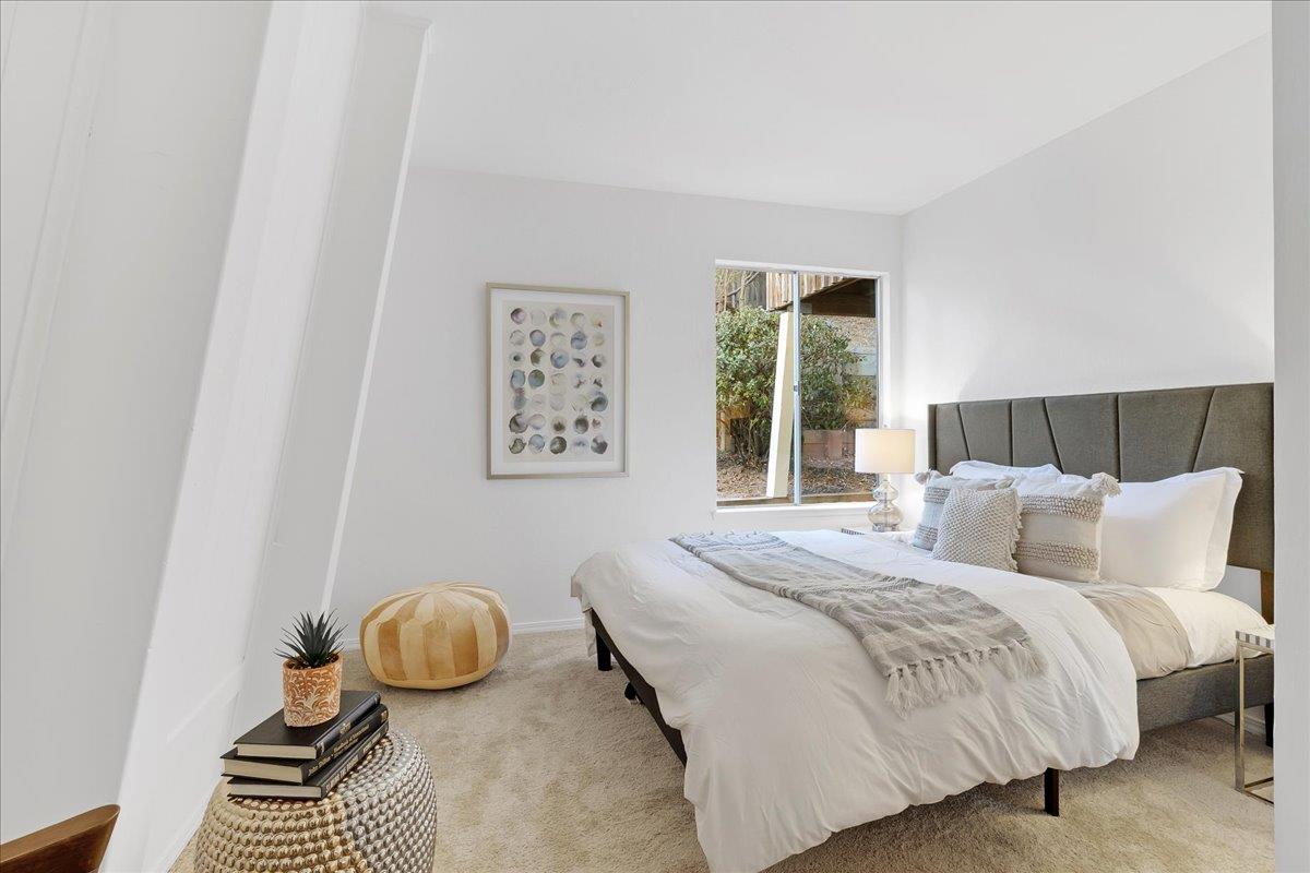 3560 Viola Drive Aromas, CA 95004 - Photo 30 of 42 a bedroom with a bed and a painting on the wall