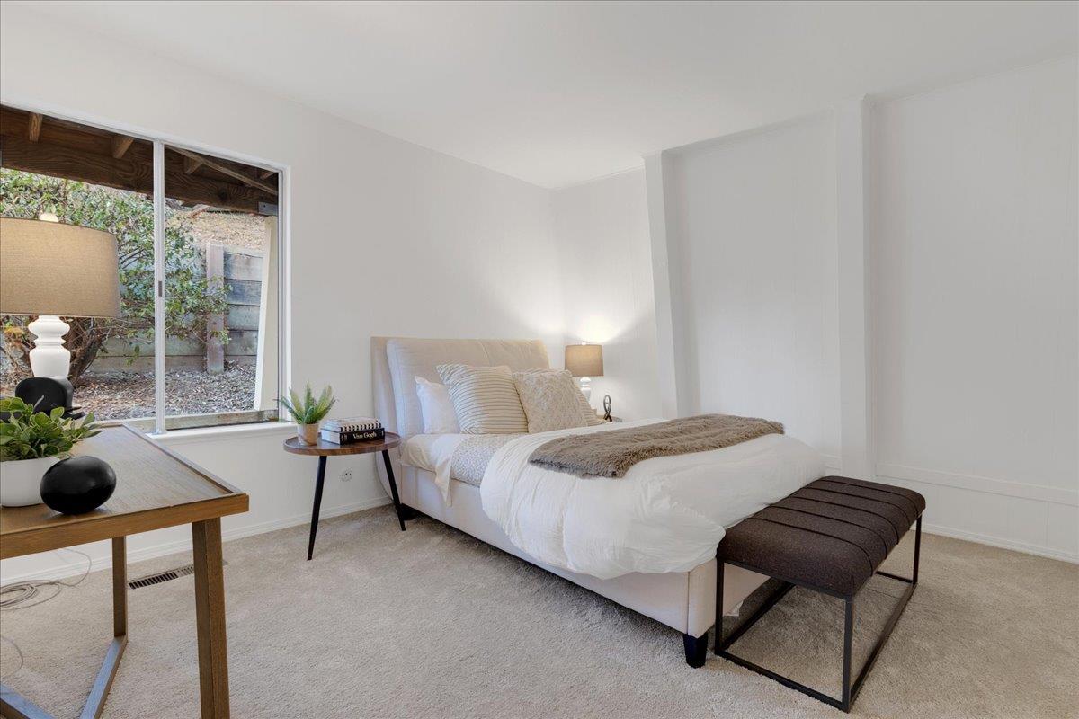 3560 Viola Drive Aromas, CA 95004 - Photo 31 of 42 a bedroom with a bed and a couch