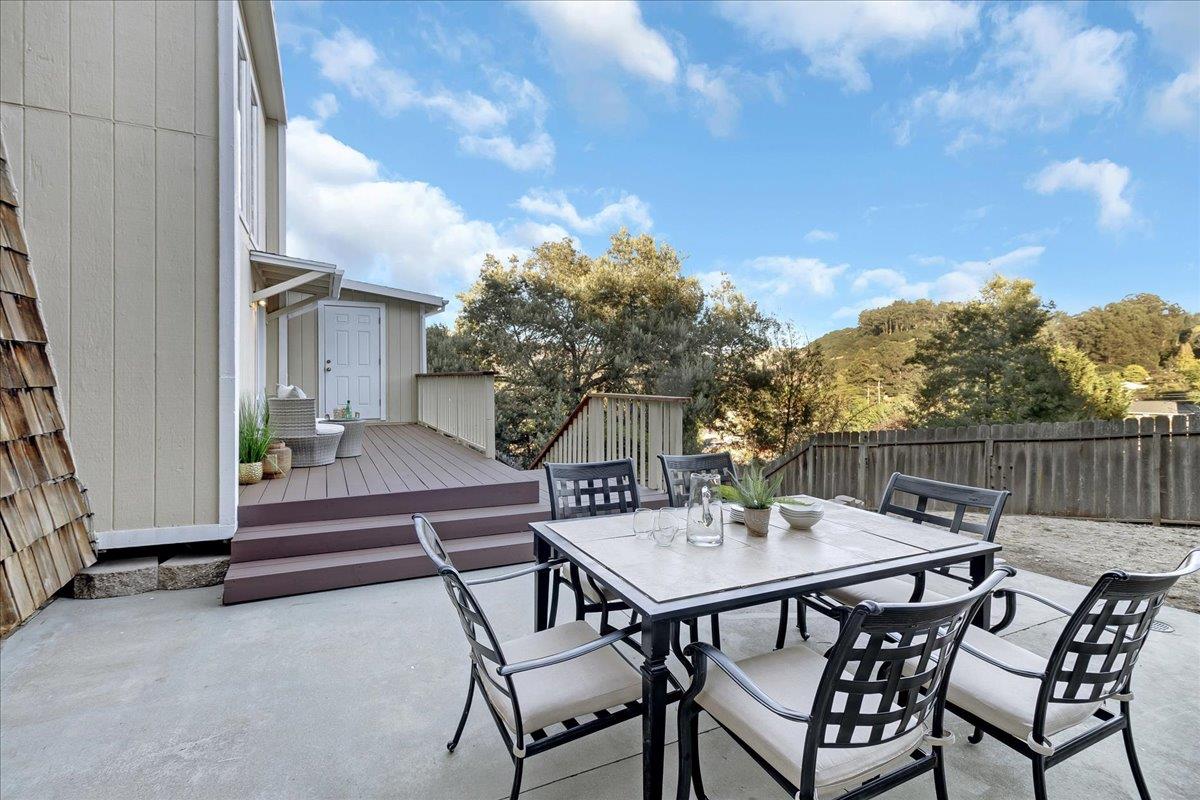 3560 Viola Drive Aromas, CA 95004 - Photo 37 of 42 a view of a chairs and table in the back yard of the house