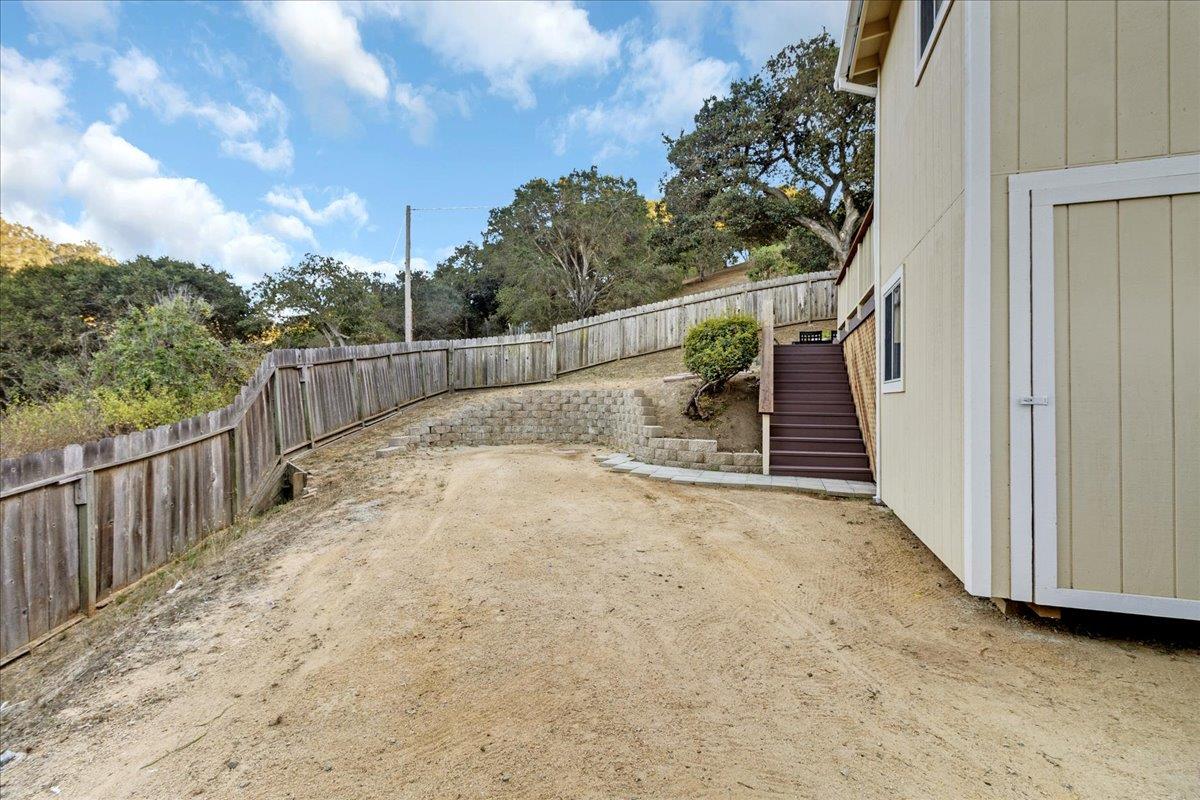 3560 Viola Drive Aromas, CA 95004 - Photo 40 of 42 a view of balcony with wooden floor and fence and trees