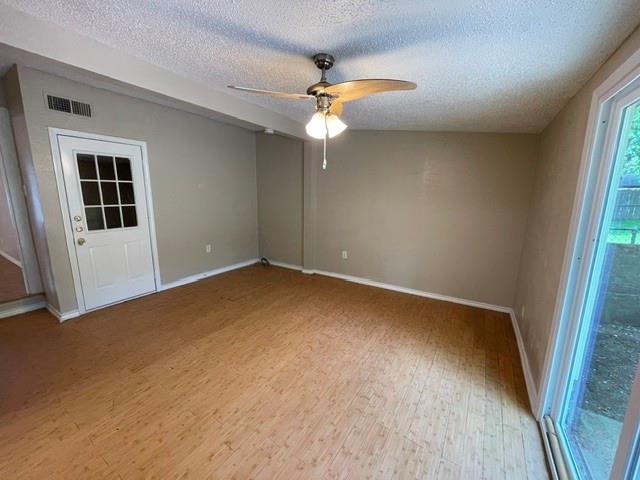 845 Rumfield Road White Settlement, TX 76108 - Photo 12 of 19 an empty room with a window and a ceiling fan