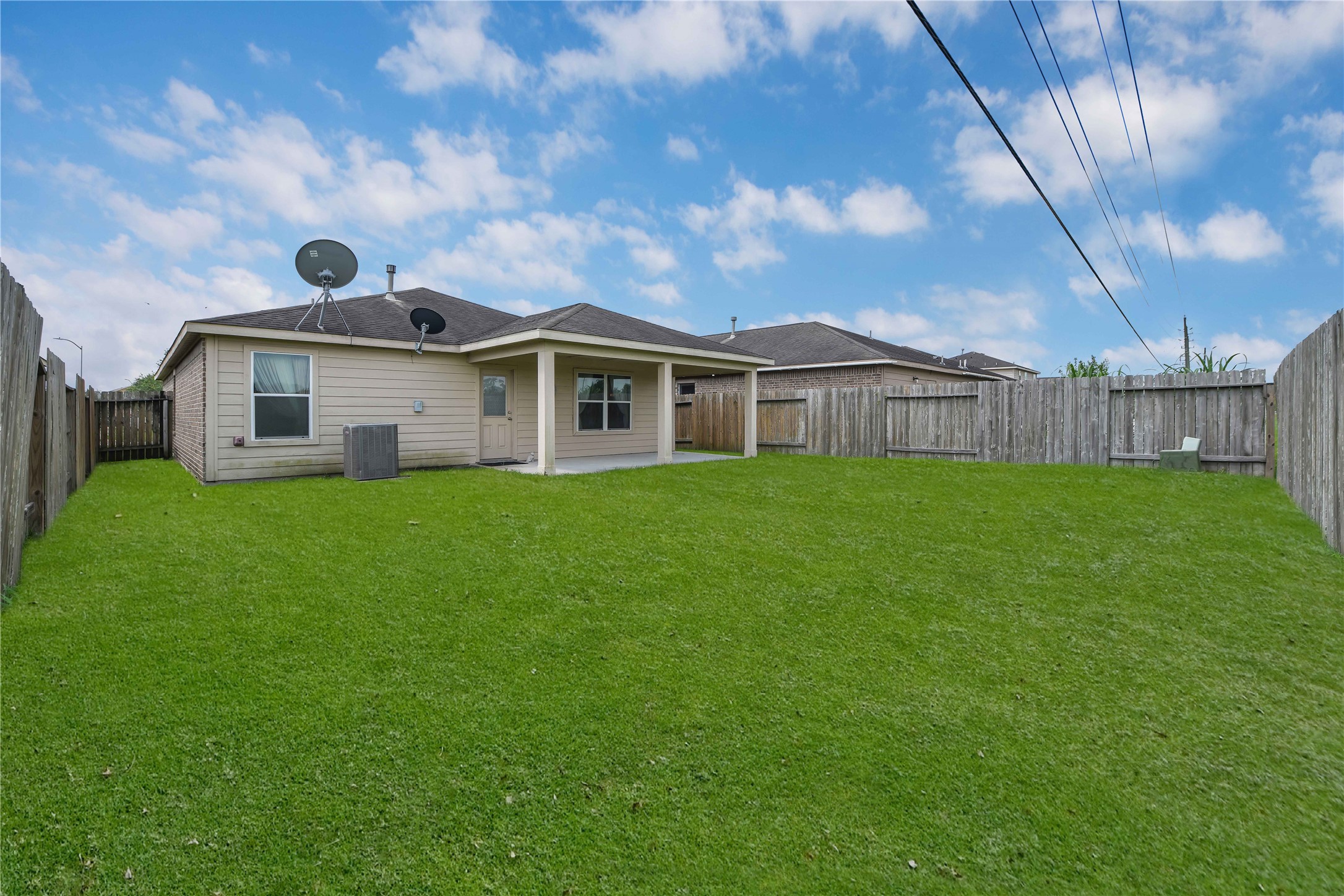 1827 Garnet Breeze Drive Rosharon, TX 77583 - Photo 22 of 23 a view of a house with a yard