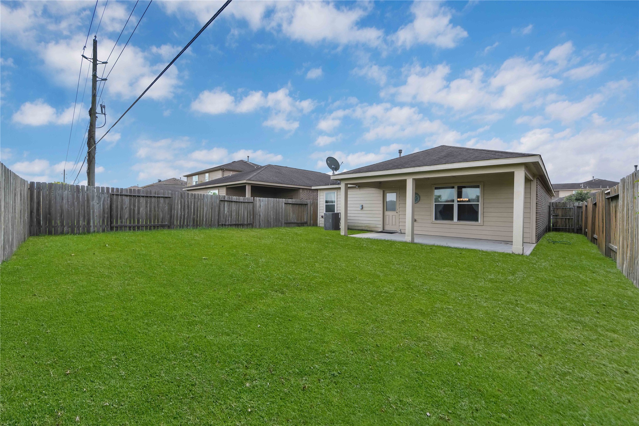 1827 Garnet Breeze Drive Rosharon, TX 77583 - Photo 23 of 23 a view of a house with a backyard