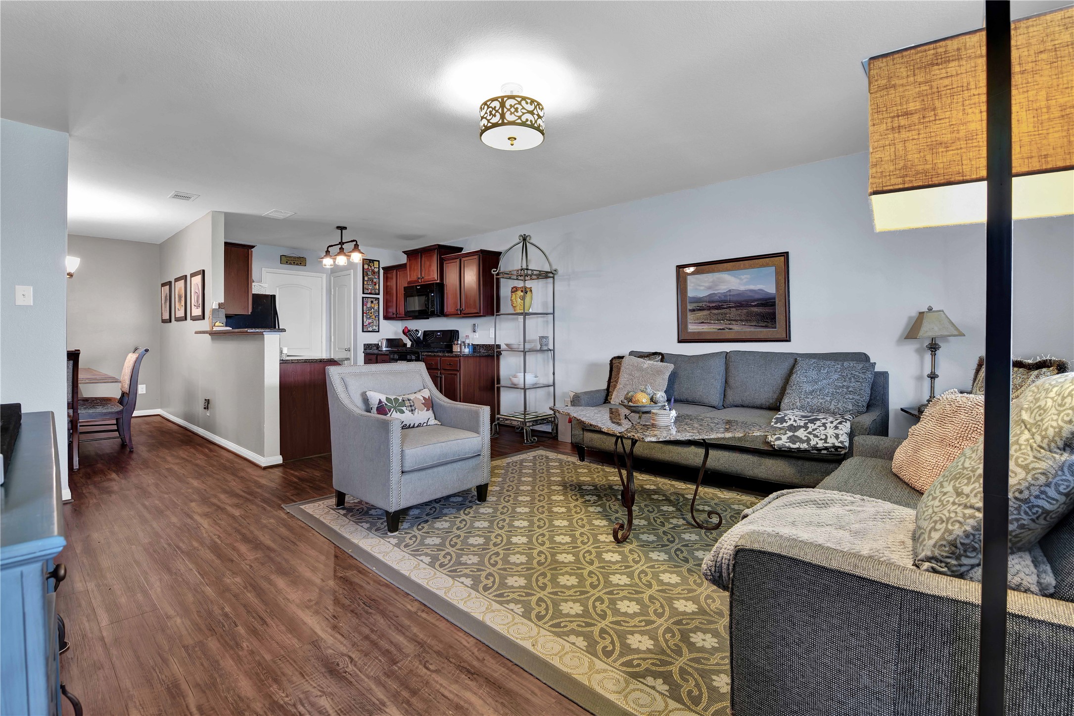 1827 Garnet Breeze Drive Rosharon, TX 77583 - Photo 5 of 23 a living room with furniture and a book shelf