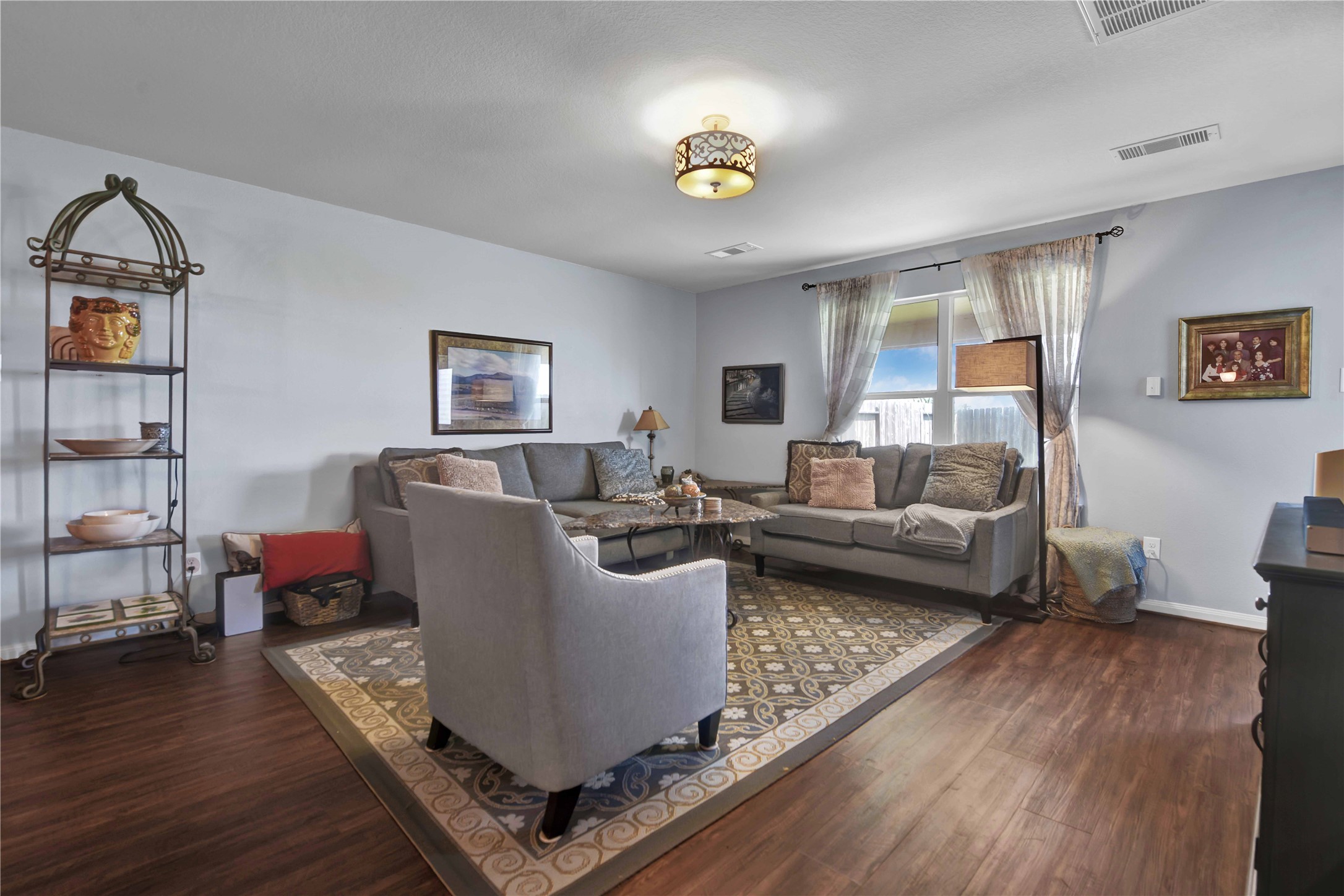 1827 Garnet Breeze Drive Rosharon, TX 77583 - Photo 7 of 23 a living room with furniture and wooden floor