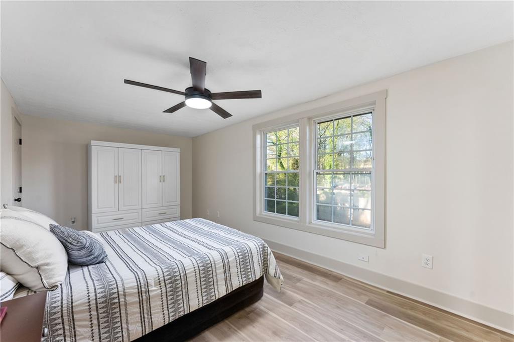 2771 Sherwood Road Southeast Smyrna, GA 30082 - Photo 20 of 40 a bedroom with a large bed and a window