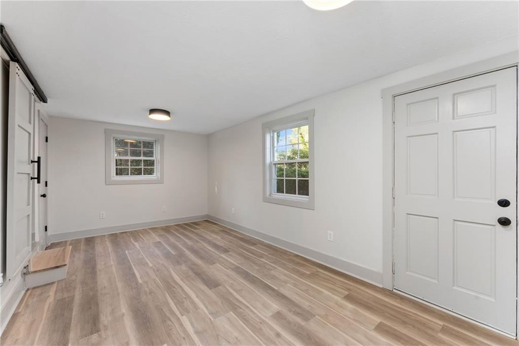 2771 Sherwood Road Southeast Smyrna, GA 30082 - Photo 25 of 40 an empty room with windows
