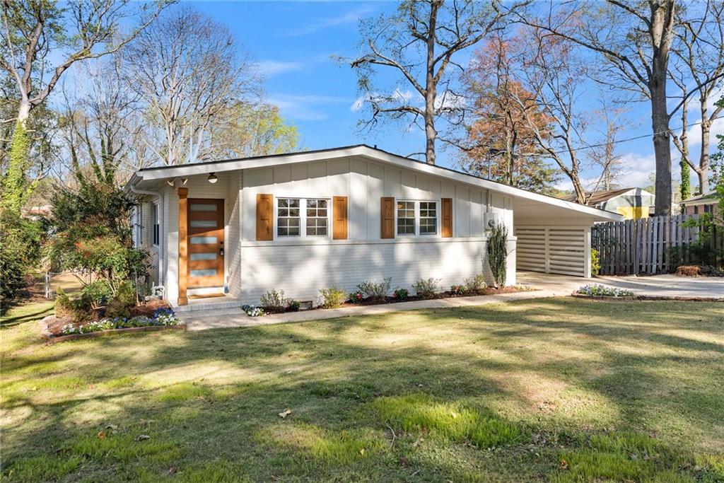 2771 Sherwood Road Southeast Smyrna, GA 30082 - Photo 40 of 40 a front view of a house with a yard