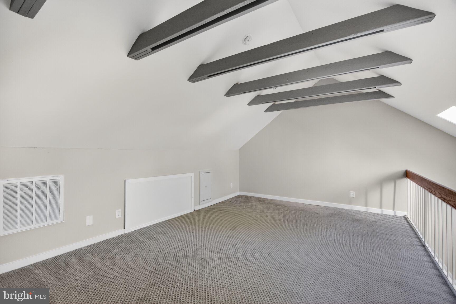 8205 Grubb Road, Unit G202 Silver Spring, MD 20910 - Photo 21 of 38 a view of a room with racks on the wall