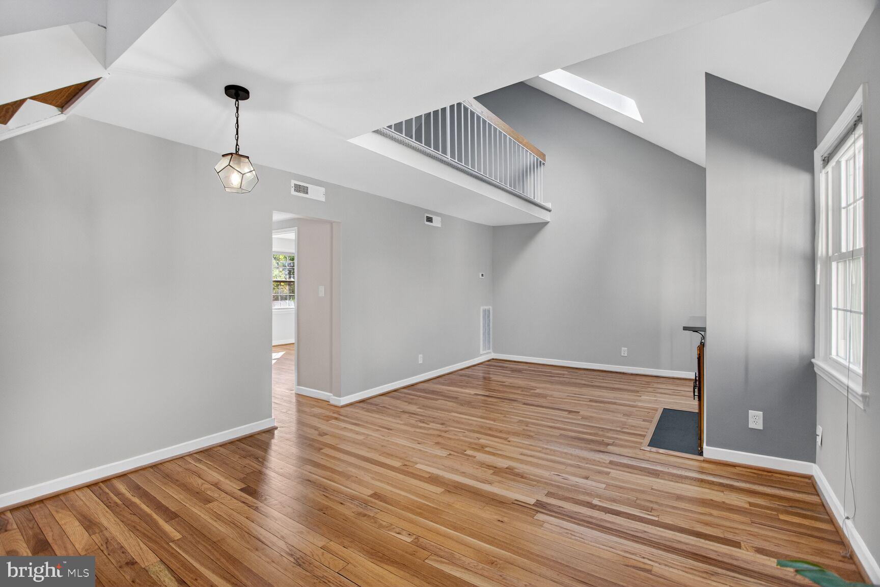 8205 Grubb Road, Unit G202 Silver Spring, MD 20910 - Photo 8 of 38 a view of a livingroom with wooden floor