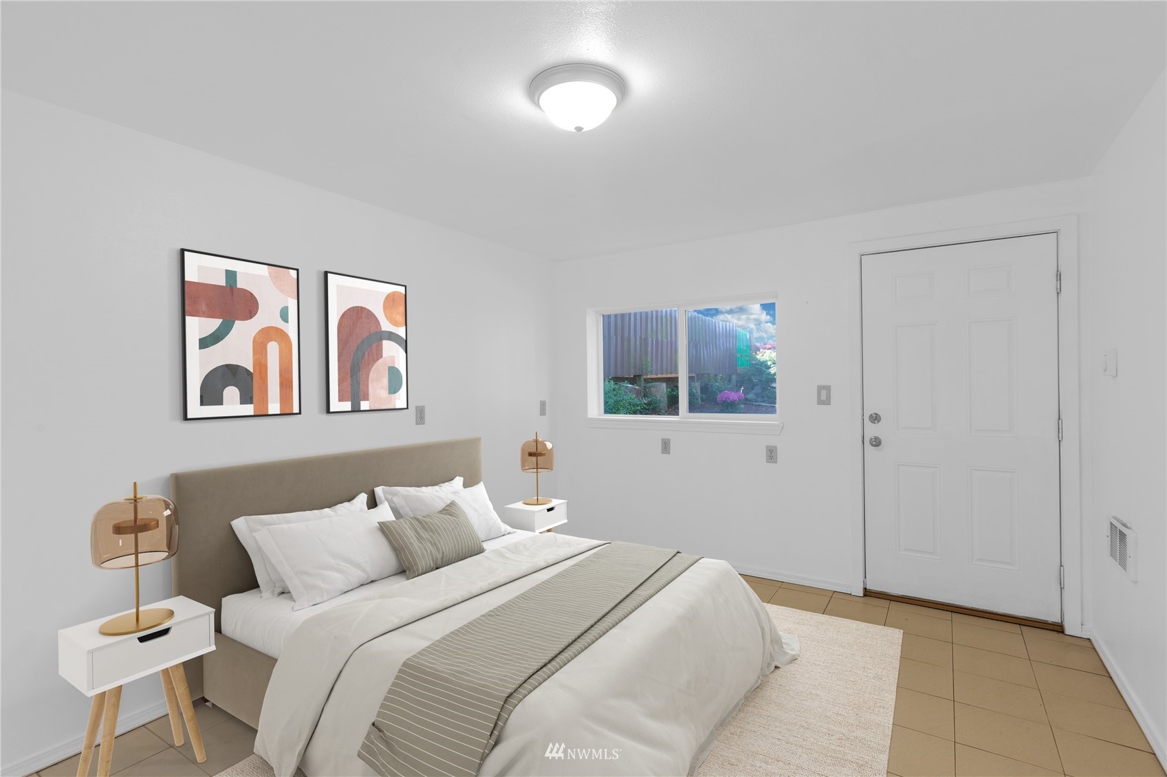2115 Northeast 8th Street Renton, WA 98056 - Photo 11 of 19 a bedroom with a bed and a painting on the wall