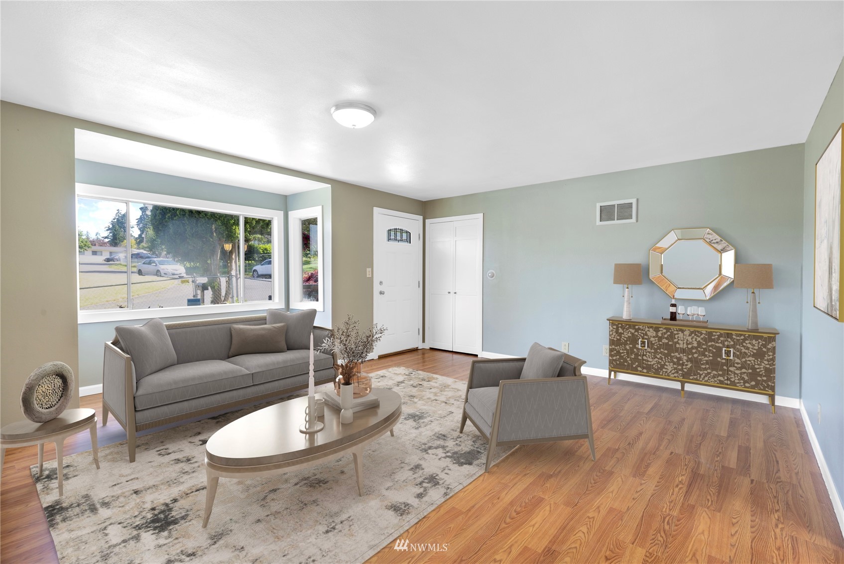 2115 Northeast 8th Street Renton, WA 98056 - Photo 3 of 19 a living room with furniture and a wooden floor